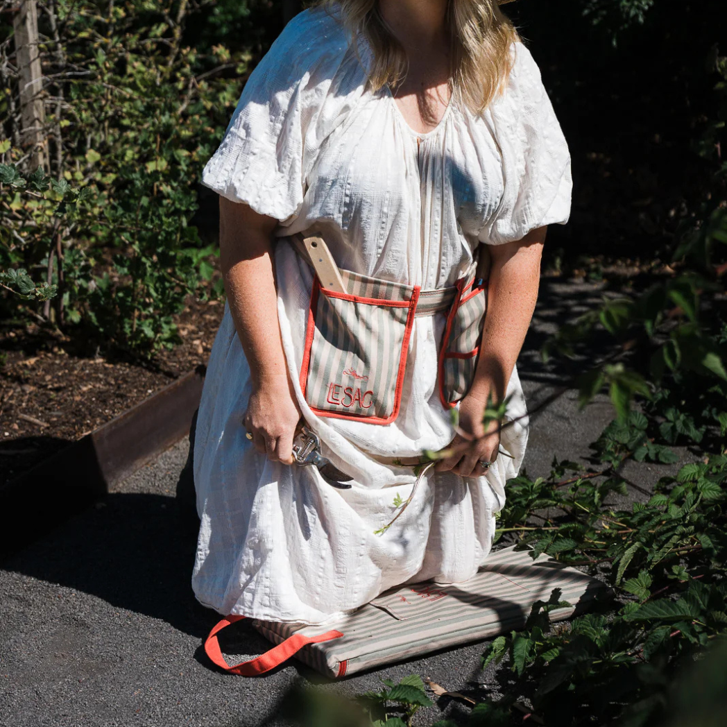 Gardener Using Le Sac Canvas Kneeler