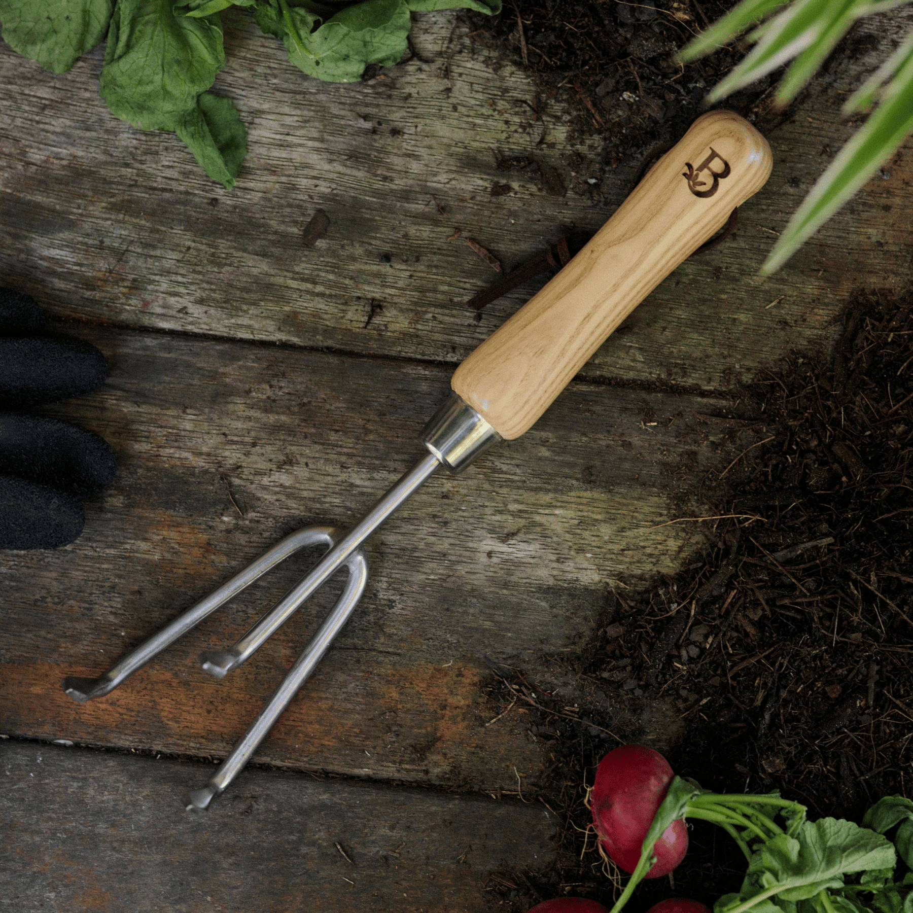 Hand Cultivator Garden Tool on Potting Bench