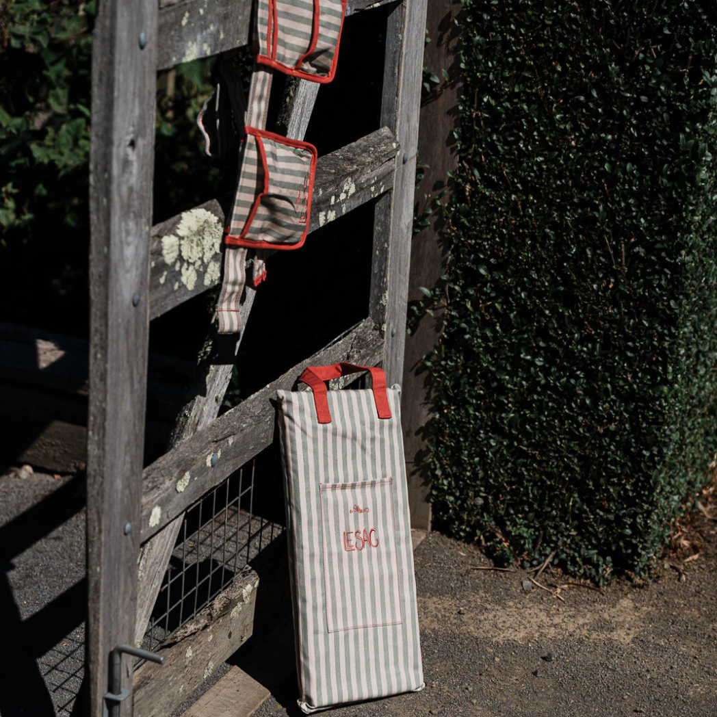 Le Sac Garden Kneeler Leaning on Gate