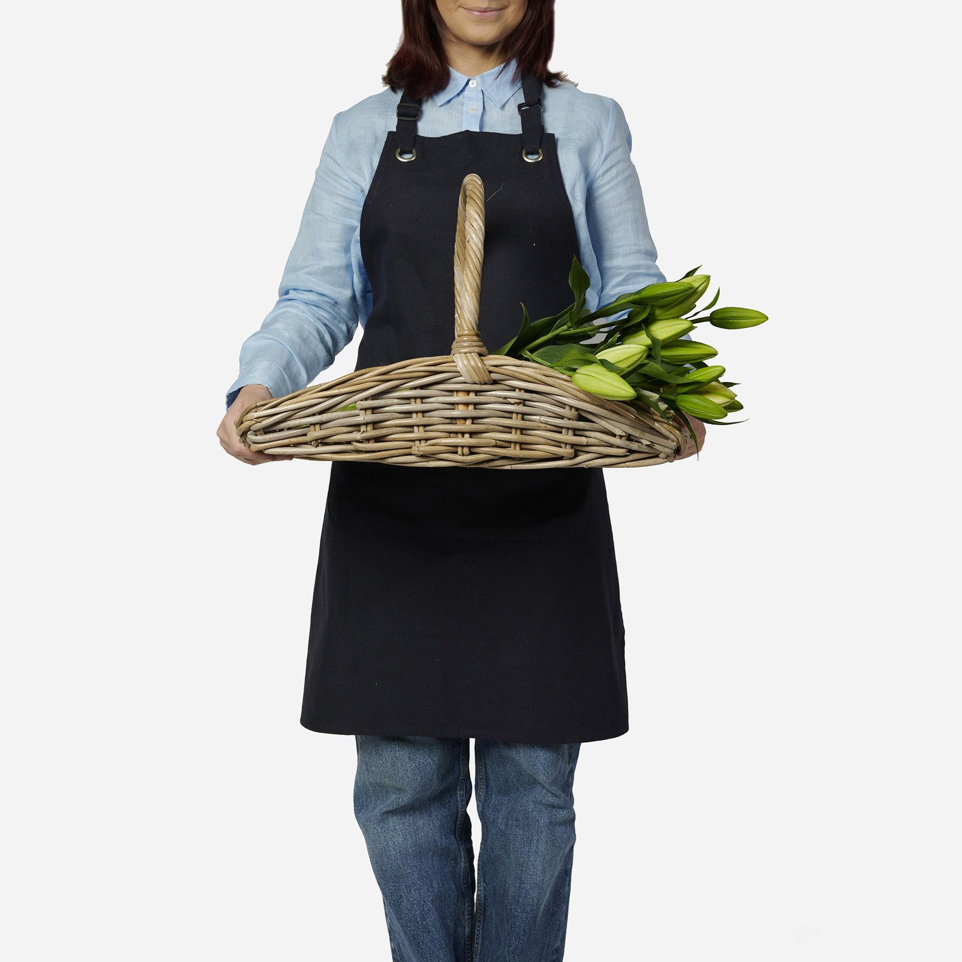 Model Holding Wicka Fiore Trug with Flowers