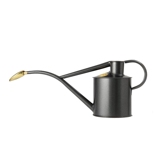 Haws 'Rowley Ripple' 1-litre indoor watering can in graphite. Introducing the ultimate multi-purpose metal watering can, an elegant and versatile companion to help you grow your own.