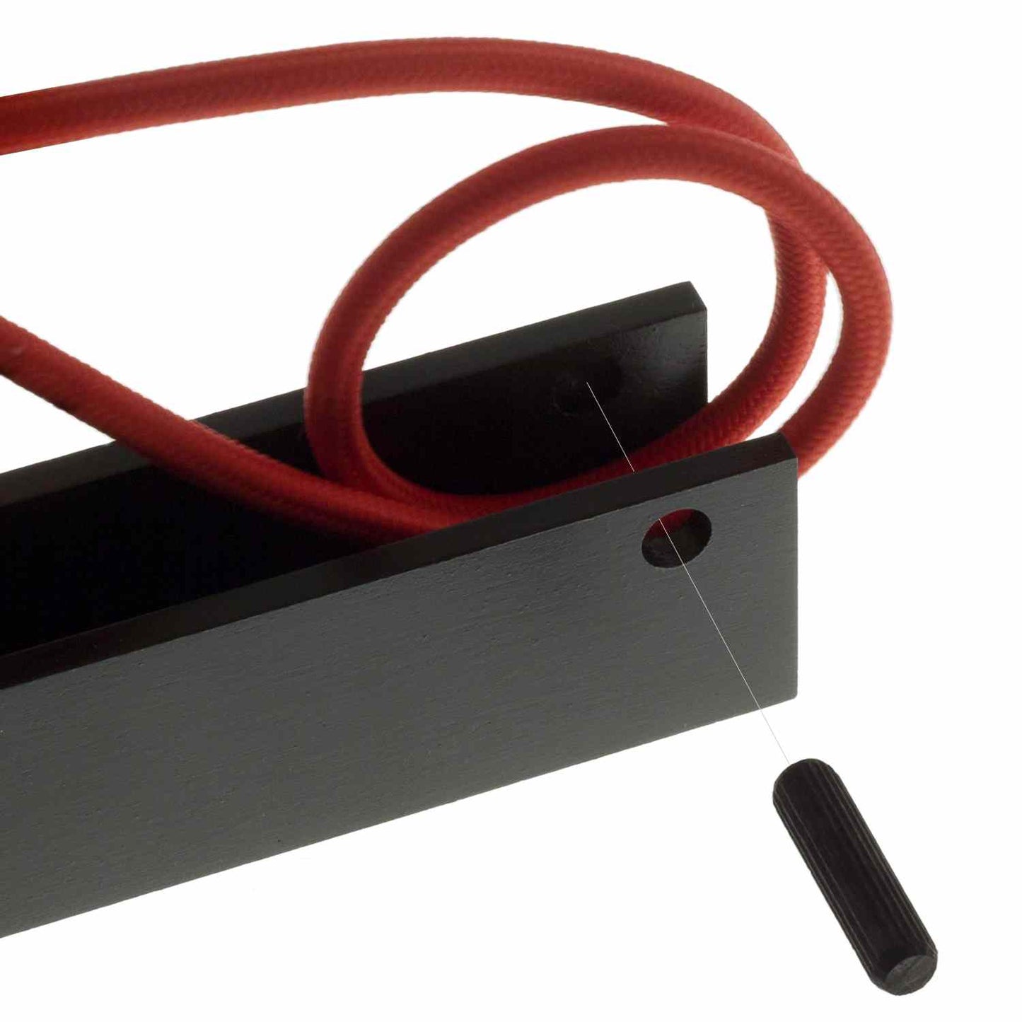 Cable wraps around wooden supports on wall mount.