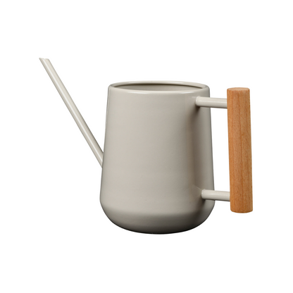This small watering can's slender spout is perfect for delivering water just where it’s needed.