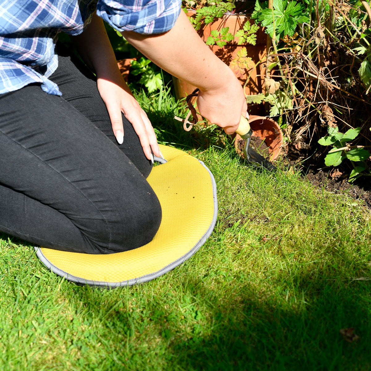 Gardener Kneeling on Yellow Kneeler