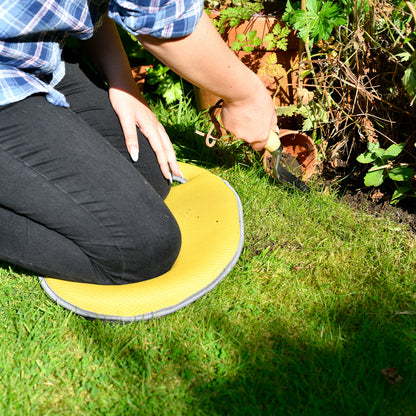 Gardener Kneeling on Yellow Kneeler
