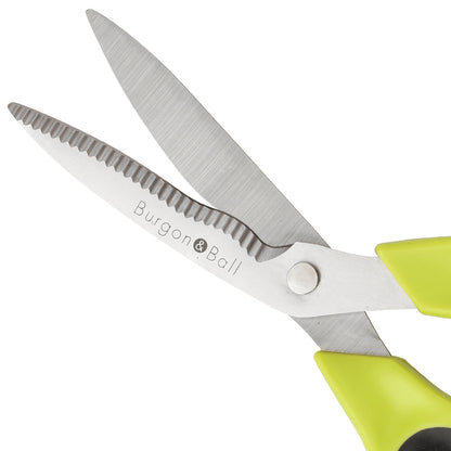 One blade is wavy and serrated, to firmly hold the stem in place while cutting.
