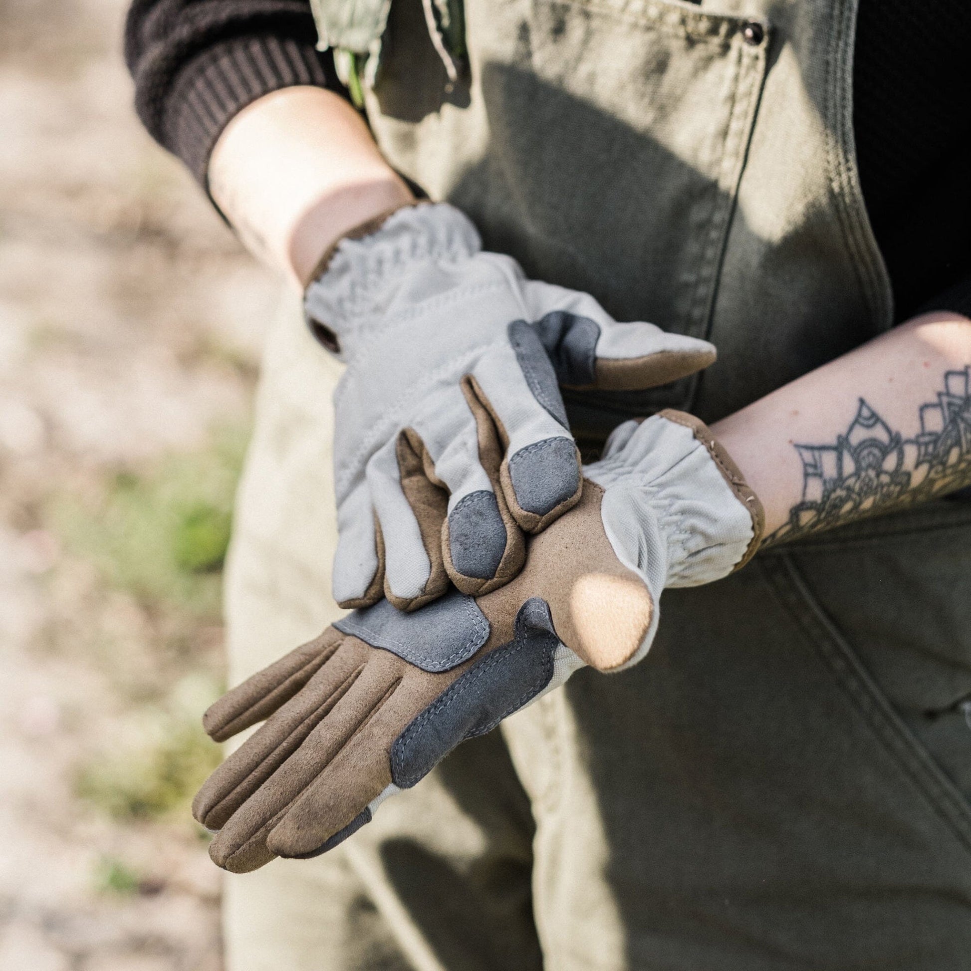 Gardener Wearing Barebones Leepa Heavy-Duty Gloves in Stone