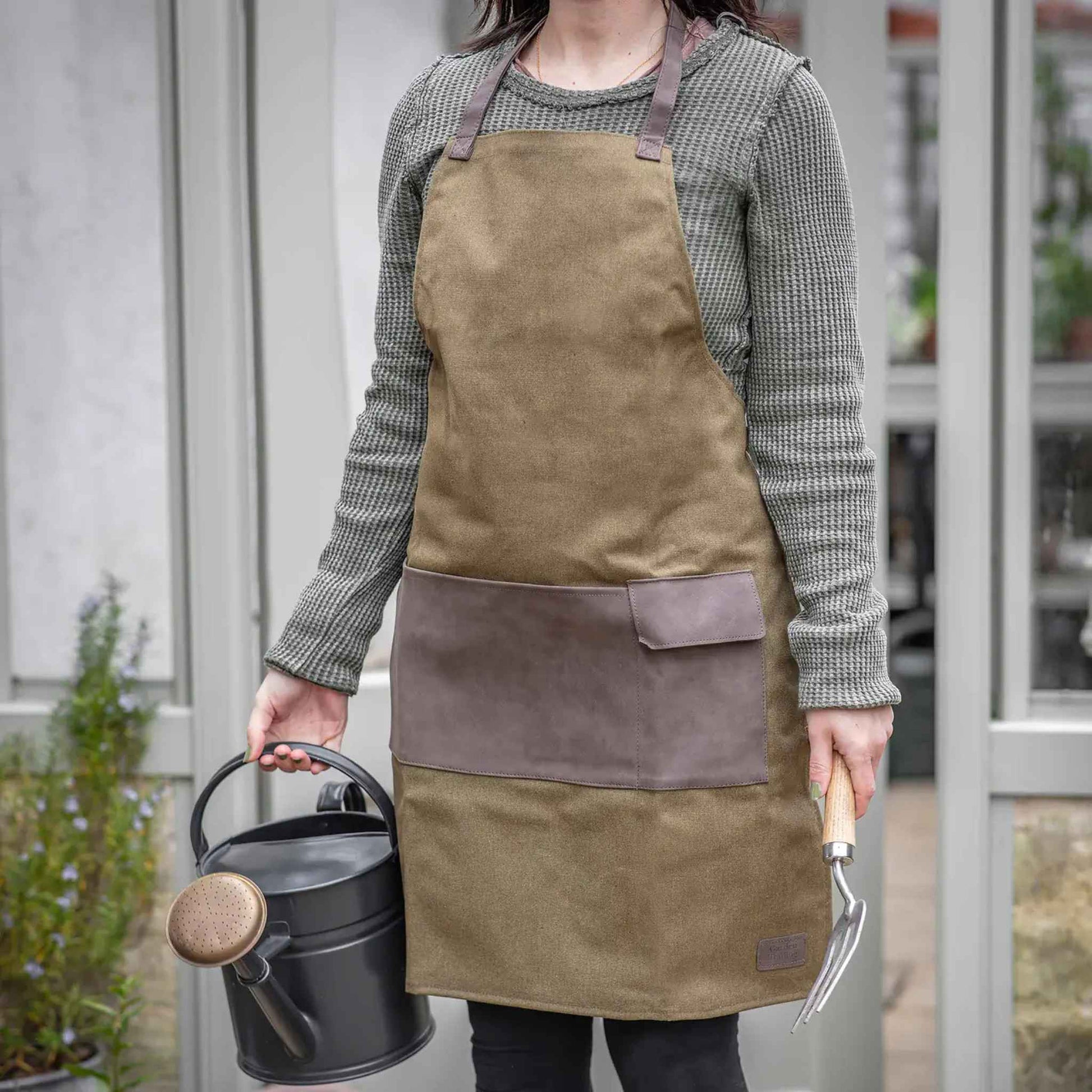 Gardener Wearing Khaki Canvas Apron