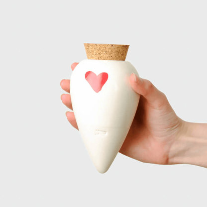 Hand Holding Pepin Olla with Heart