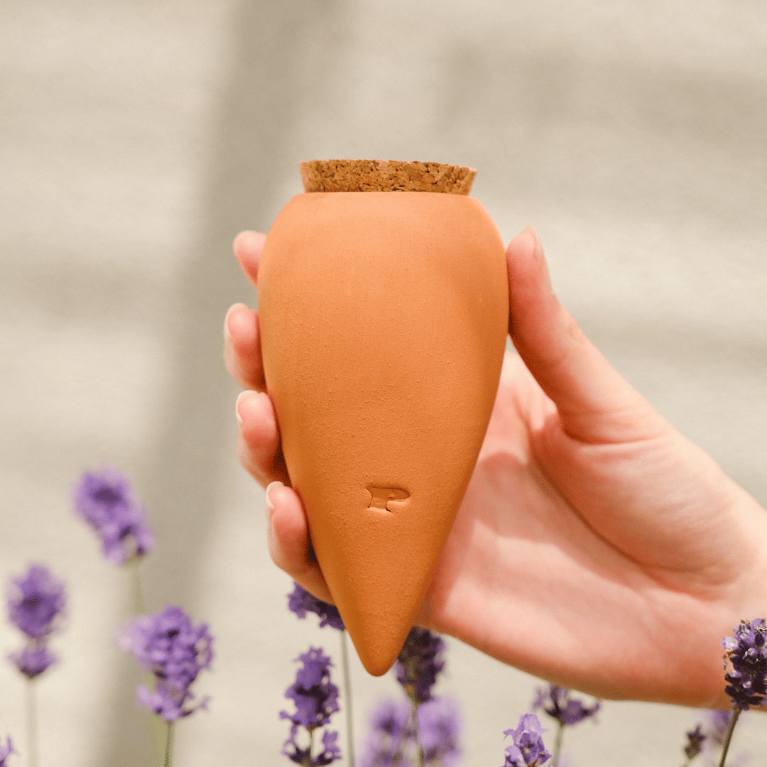 Hand Holding Pepin Teraccotta Mini Olla