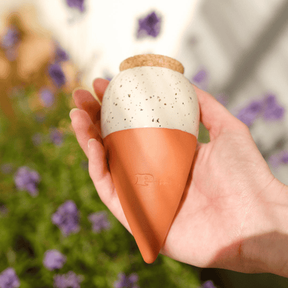 Hand Holding Pepin White Speckled Mini Olla