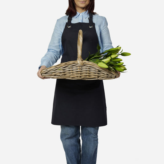 Model Holding Wicka Fiore Trug with Flowers