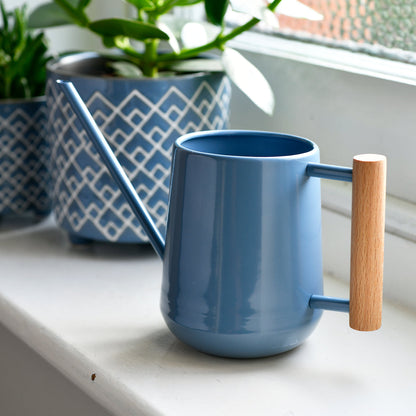 Burgon & Ball Heritage Blue Indoor Watering Can on windowsill with plants.