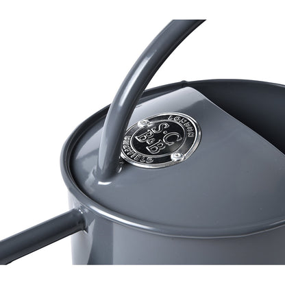 The beautiful understated grey of the hardwearing powder coating marks this watering can out as a design of distinction, and a metal seal bearing the Sophie Conran for Burgon & Ball logo on the top surface of the can adds the finishing touch.