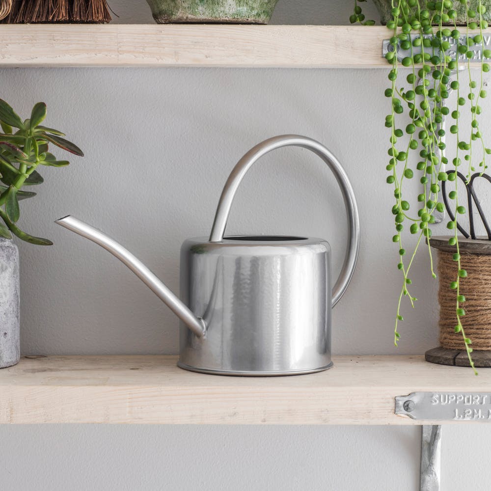 The narrow spout and high handle are super helpful when it comes to watering hanging pots or tabletop terrariums and pots on high shelves.