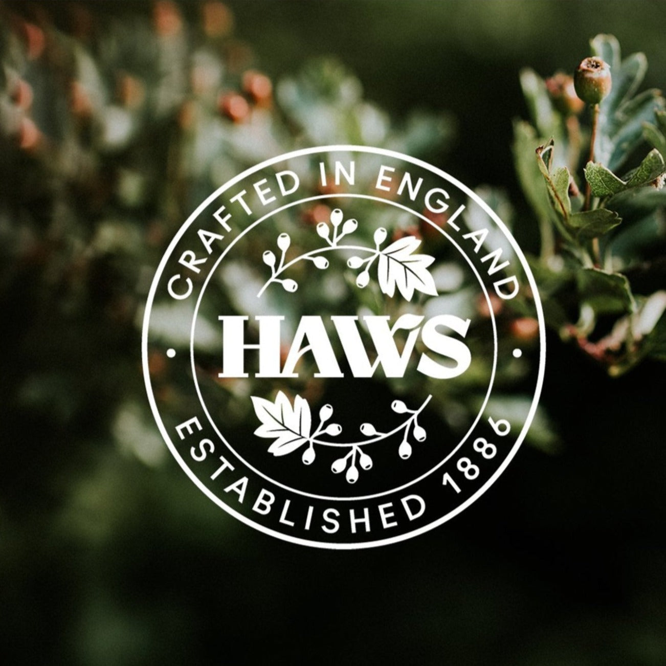 Haws watering cans logo. Crafted in England. Established 1886.