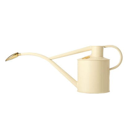 Haws 'Rowley Ripple' 1-litre indoor watering can in cream. Introducing the ultimate multi-purpose metal watering can, an elegant and versatile companion to help you grow your own.