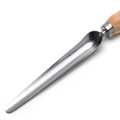 This unique little tool is best described as a cross between a trowel and a dibber.